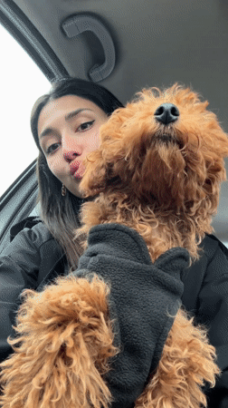 Woman with poodle caught in heavy rainfall in Montenegro