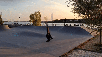 Antwerp waterfront park buzzing with evening activity