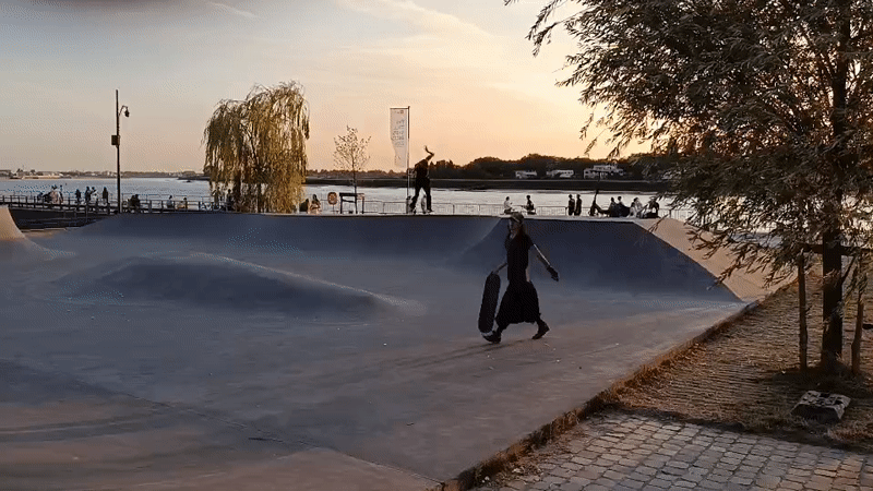 Antwerp waterfront park buzzing with evening activity