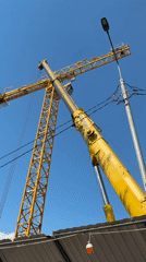 Construction cranes operating under clear skies in Moscow