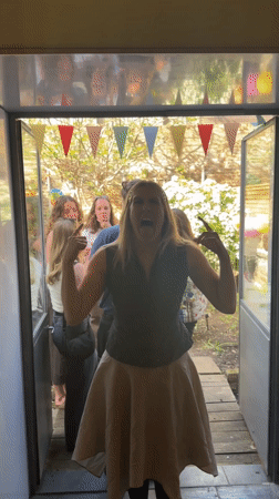 Outdoor social gathering draws adults to London garden setting