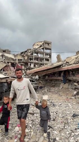 Families navigate destruction in Jabalia amid damaged buildings