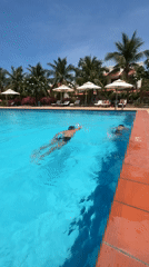 Family Swimming Session Captured at Vietnam Pool Facility