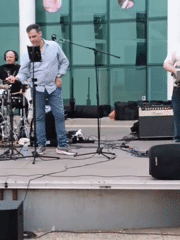 Outdoor band performance draws dancing crowd in Ripollet Spain