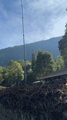 Witness documents mountain landscape with buildings and pathways