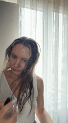 Woman with wet hair observed indoors in Esenyurt, Turkey
