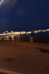 Night view captured of illuminated Saint Petersburg cityscape and bridge