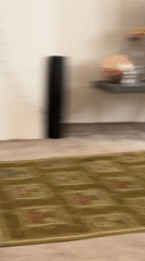 White Poodle plays indoors, drops toy and yawns
