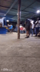 Night gathering under covered structure in Vallecito, Venezuela
