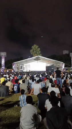 Outdoor football screening draws big crowd in Dhaka at night