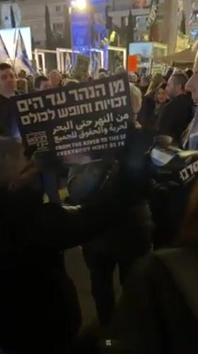 Nighttime demonstration with mixed messaging held in Tel Aviv