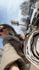 Woman takes selfie with baby in stroller in Vitenyovo