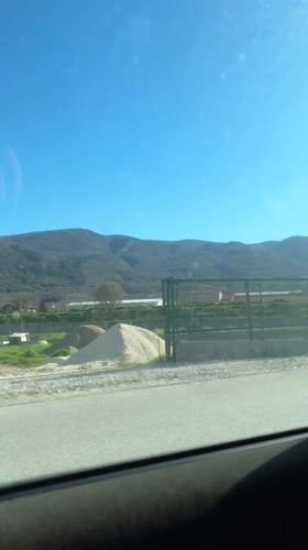 Driver records roadside view near Kuklen, Bulgaria