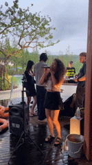 Live performance at a lakeside outdoor venue in Liangjiang