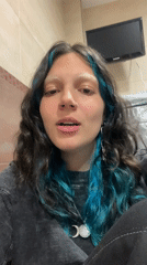 Woman films content at home while job searching online