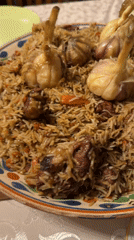 Traditional pilaf prepared on wood stove in rural Russia