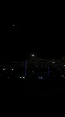 Nighttime vehicle footage captured in Medellín shows distant lights