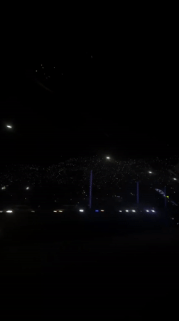 Nighttime vehicle footage captured in Medellín shows distant lights