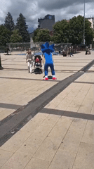 Sonic costume performer entertains family in Bulgarian town square