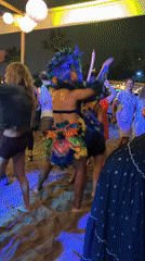 Nighttime foam beach party draws crowds in Chorrillos, Peru
