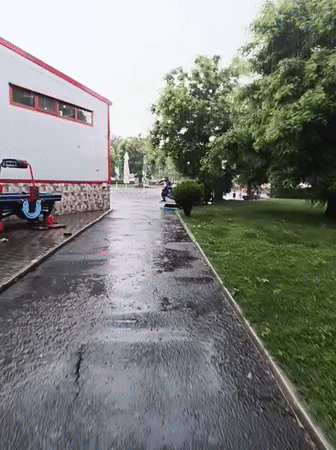 Rainy afternoon street scenes documented across Karnobat, Bulgaria