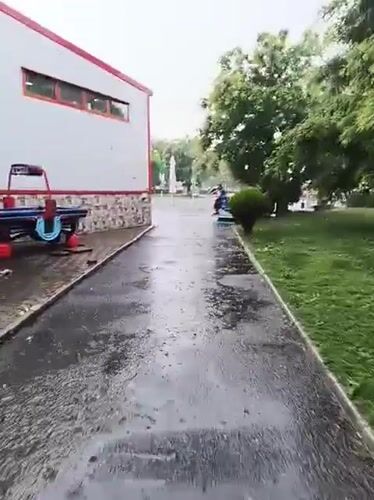 Rainy afternoon street scenes documented across Karnobat, Bulgaria