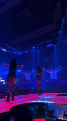 Nightclub performers entertain patrons during evening hours