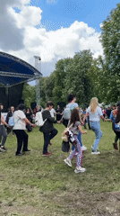 Outdoor festival with vendors, stage draws crowds in Pleven