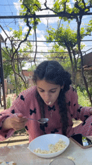 Family breakfast outdoors in Bulgarian village captured by witnesses