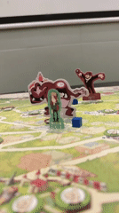 Board game session features action figures in fire cabinet
