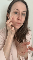 Woman documents morning skincare routine in Kudrovo apartment