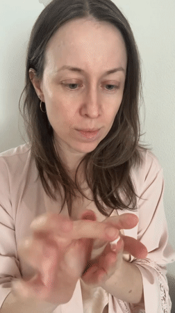 Woman documents morning skincare routine in Kudrovo apartment