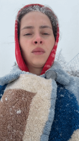 Woman in red hood spotted in snowy Yekaterinburg