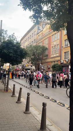 Pride parade through Sofia's historic center at dusk