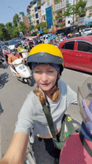 Morning motorbike commute through bustling Hà Nội streets