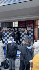 K-pop style group performs on outdoor stage in Osaka