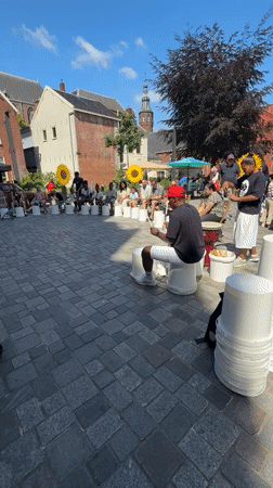 Bucket drum circle on a sunny Groningen plaza