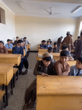 Male students attend class in Kandahar classroom