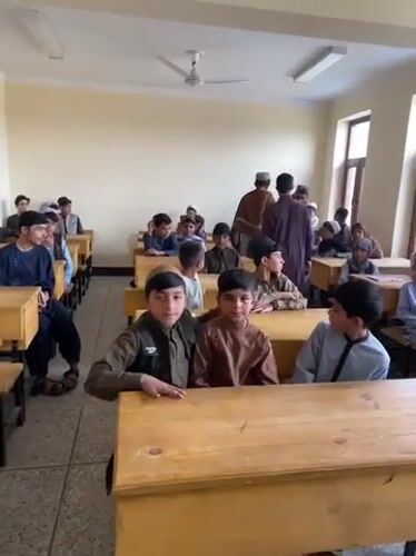 Male students attend class in Kandahar classroom