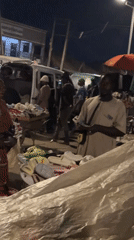 Nighttime market activity documented across Bukuru, Nigeria commercial district