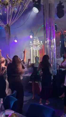 Women dance at upscale venue in Si Sunthon Thailand