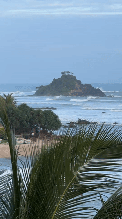 Quiet coastal scenes along the shoreline near Goviyapana, Sri Lanka