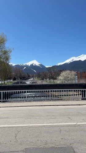Spring mountain vista captured from roadside bridge in Bansko