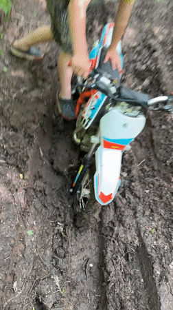 Child's dirt bike adventure in Russian countryside ends stuck
