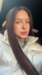 Woman in striped sweater documented by witnesses in Moscow