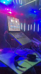 Nightclub event with DJ and colorful lights in Nnewi