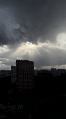Dramatic skies over a quiet Moscow neighborhood afternoon