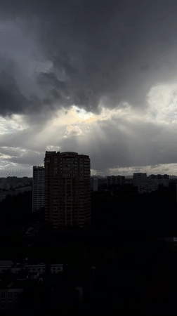 Dramatic skies over a quiet Moscow neighborhood afternoon