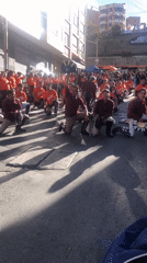 Street parade with coordinated dance groups performs in La Paz