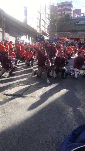 Street parade with coordinated dance groups performs in La Paz